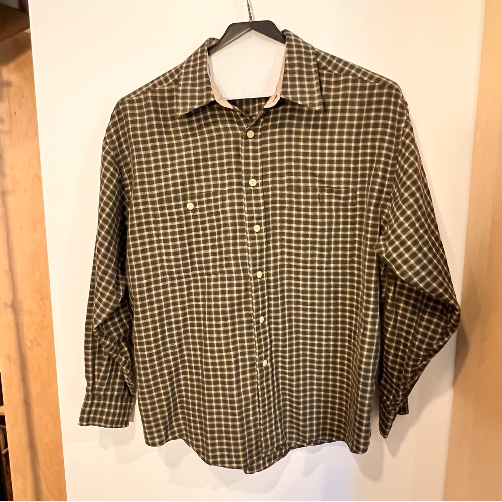 Men’s used long sleeve Khaki Arrow shirt.